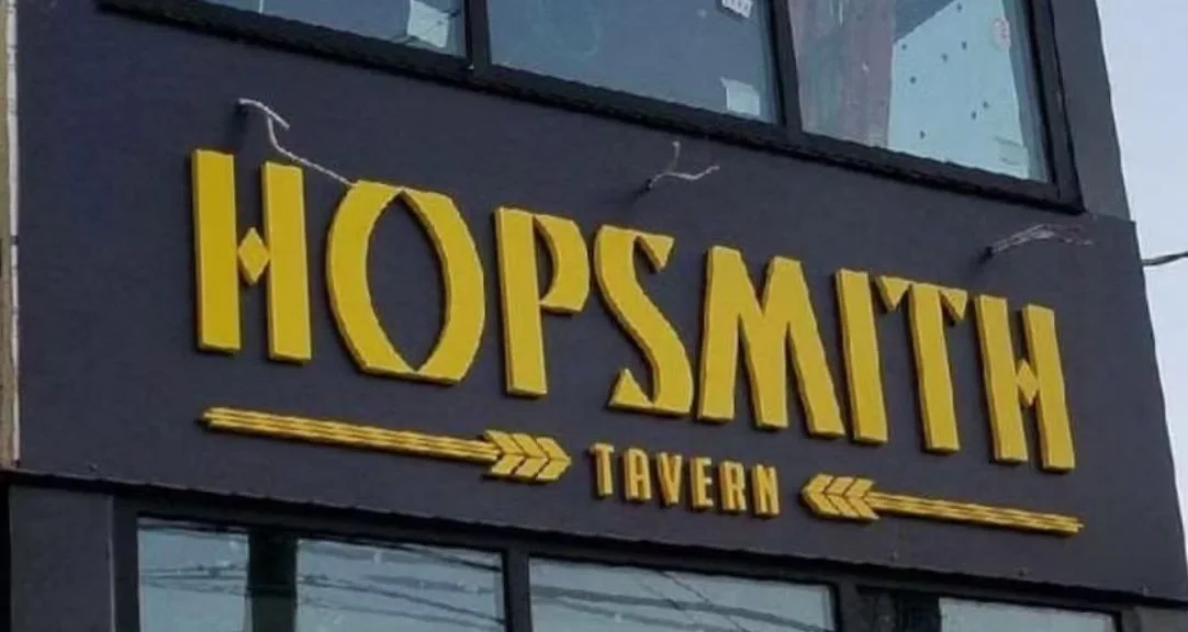 Dimensional Hopsmith Tavern building sign with raised letters