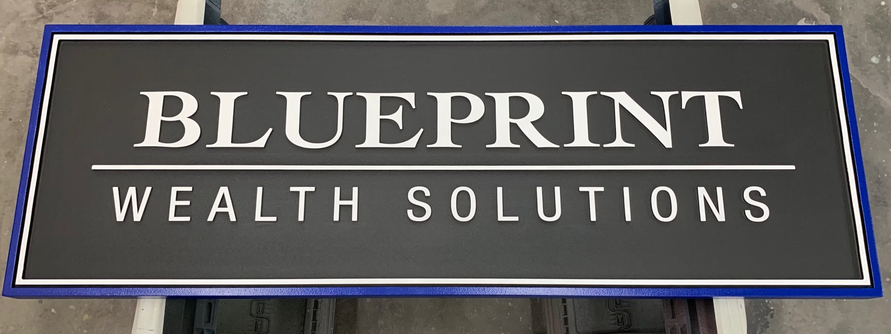 Blueprint Wealth Solutions dimensional office sign with raised lettering