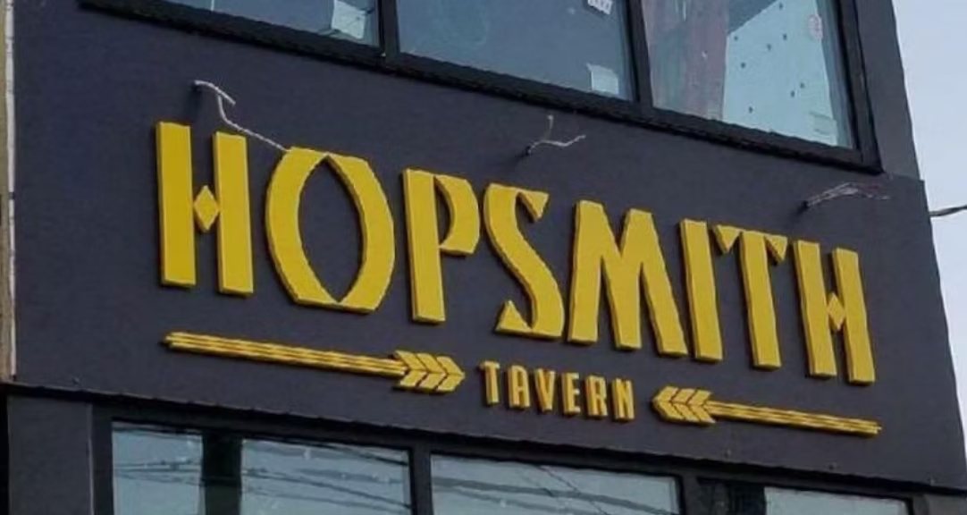 Dimensional Hopsmith Tavern building sign with raised letters