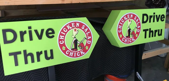 Chicken Salad Chick drive thru directional signs