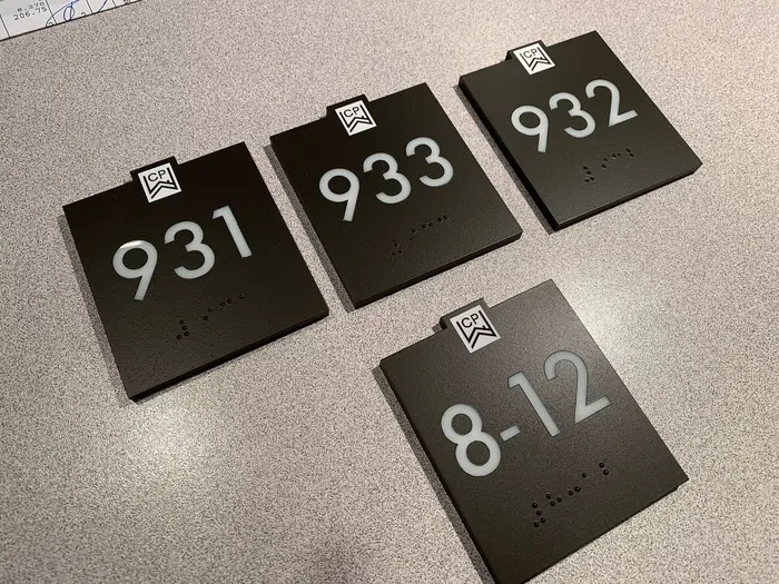 Black custom address and hours plaques