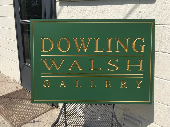 Green and gold Dowling Walsh Gallery sign