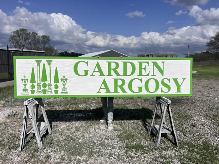 Large green and white Garden Argosy dimensional sign outdoors