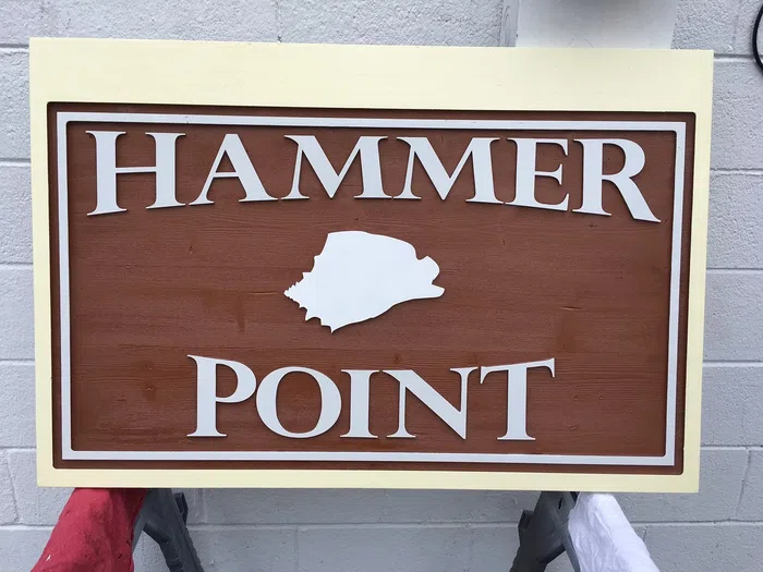 Brown and cream Hammer Point property sign